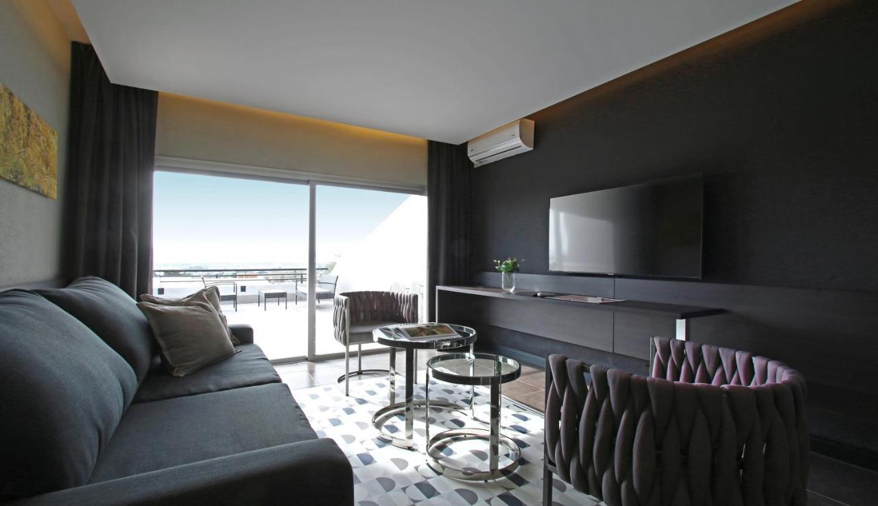 Pinares Panorama Suites, Spa & Convention Center Villa Carlos Paz Exterior photo